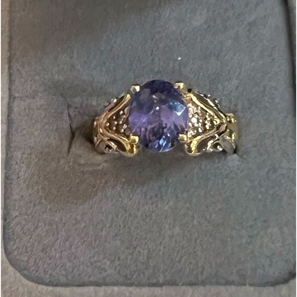 Tanzanite and diamond ring with 14 k gold accents size 7